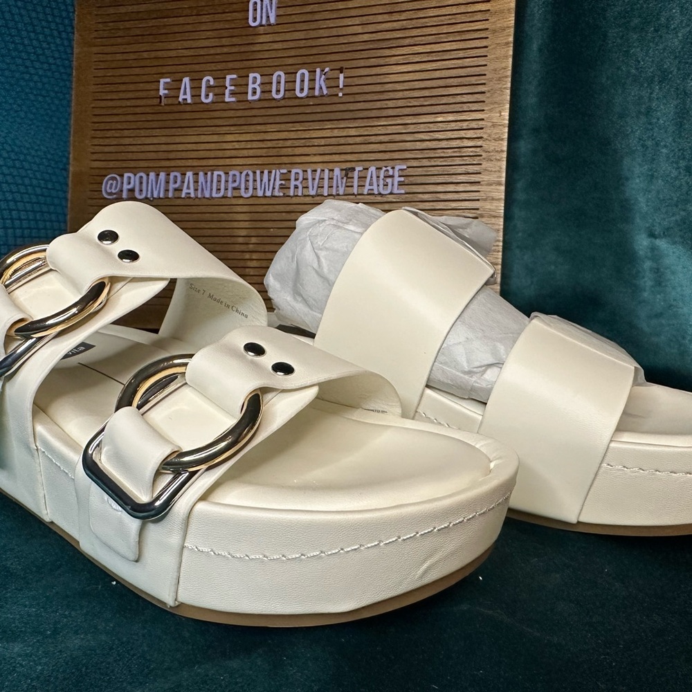Dolce Vita Cream Sandals with Gold Buckles